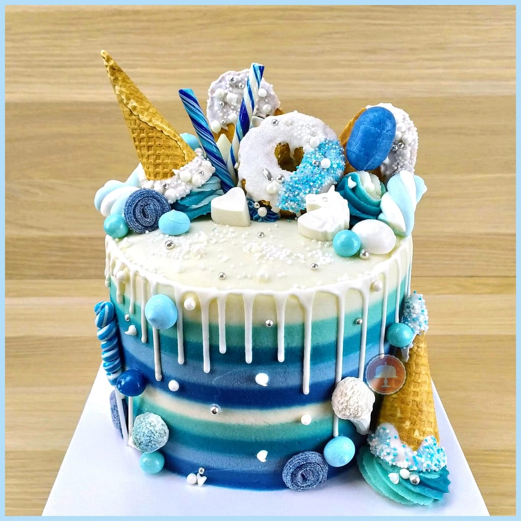 candy striped drip cake blue and white color palette