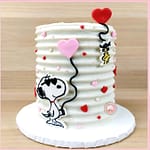 snoopy valentines cake with hearts and woodstock