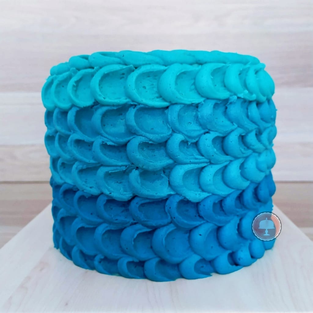 #1 Gone Fishing Cake: Easy Guide for Stunning Results 6 buttercream piping in aqua colors for the gone fishing birthday cake