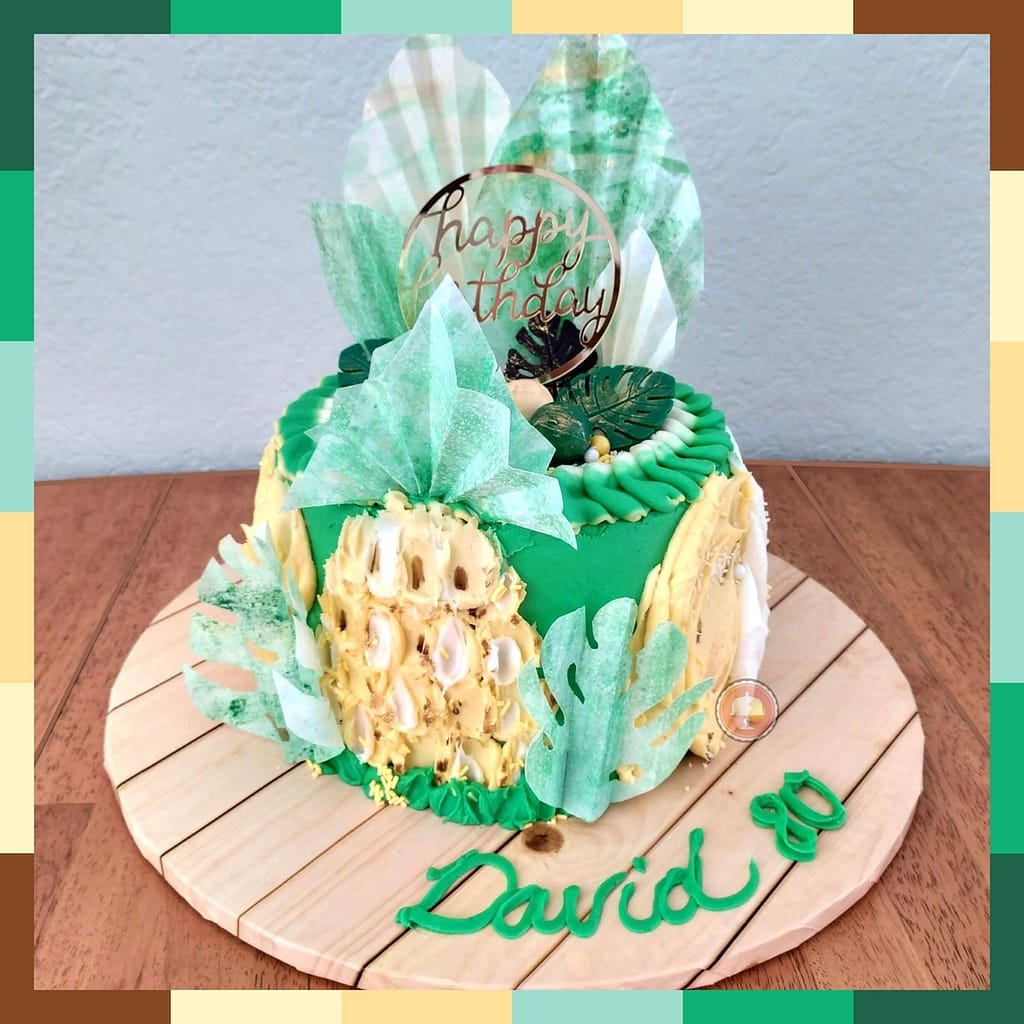 5 Steps to a Surprisingly Simple Festive Pineapple Cake Design 11 pineapple cake design birthday cake with lime buttercream wafer paper fans and leaves candy melt chocolate molds edible luster dust