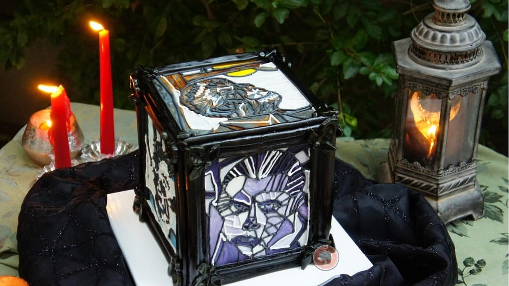 monster cake design with classic hollywood monsters stained glass piping technique in a square photo block style