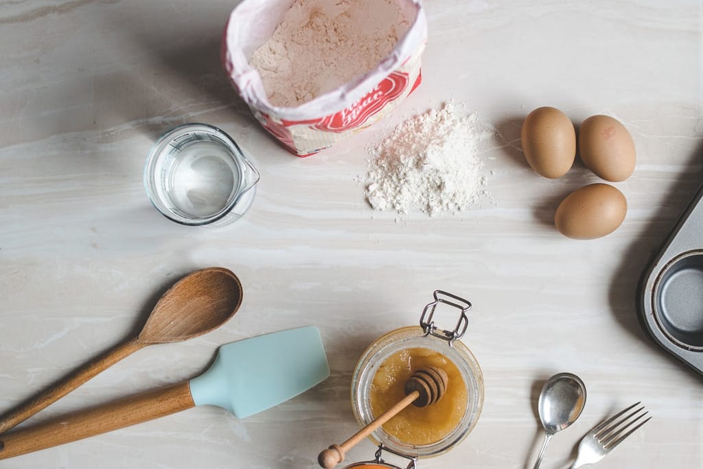 Top 50 Baking & Cake Decorating Struggles 5 wooden ladle and spatula on top of table