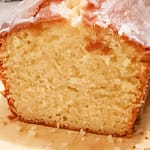 50+ Gorgeous Cake Design Ideas for Those Who Love Cake 15 lemon loaf cake showing the inside of the cake with fluffy lemon and a sugar drizzle on top