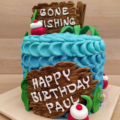 About 4 fishing cake with buttercream and gone fishing