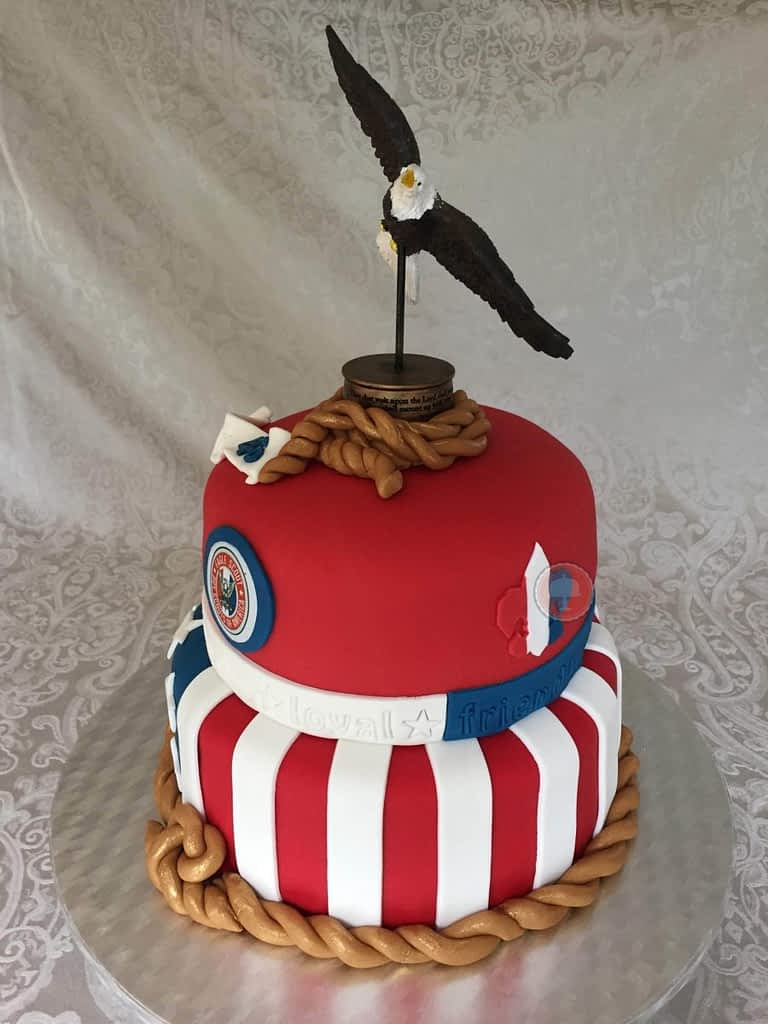 eagle scout cake red white and blue with fondant and eagle on top two tier