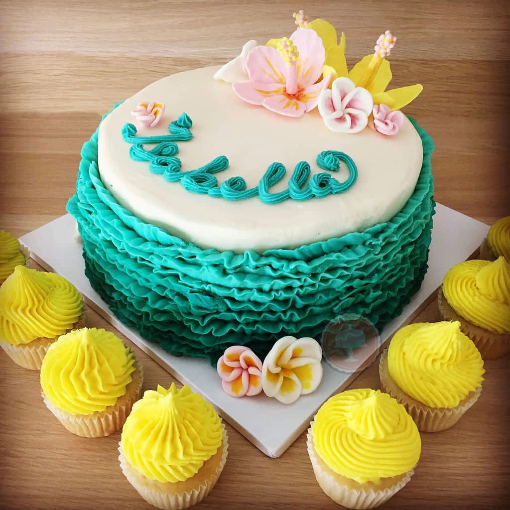 tropical cake with ruffles and flowers