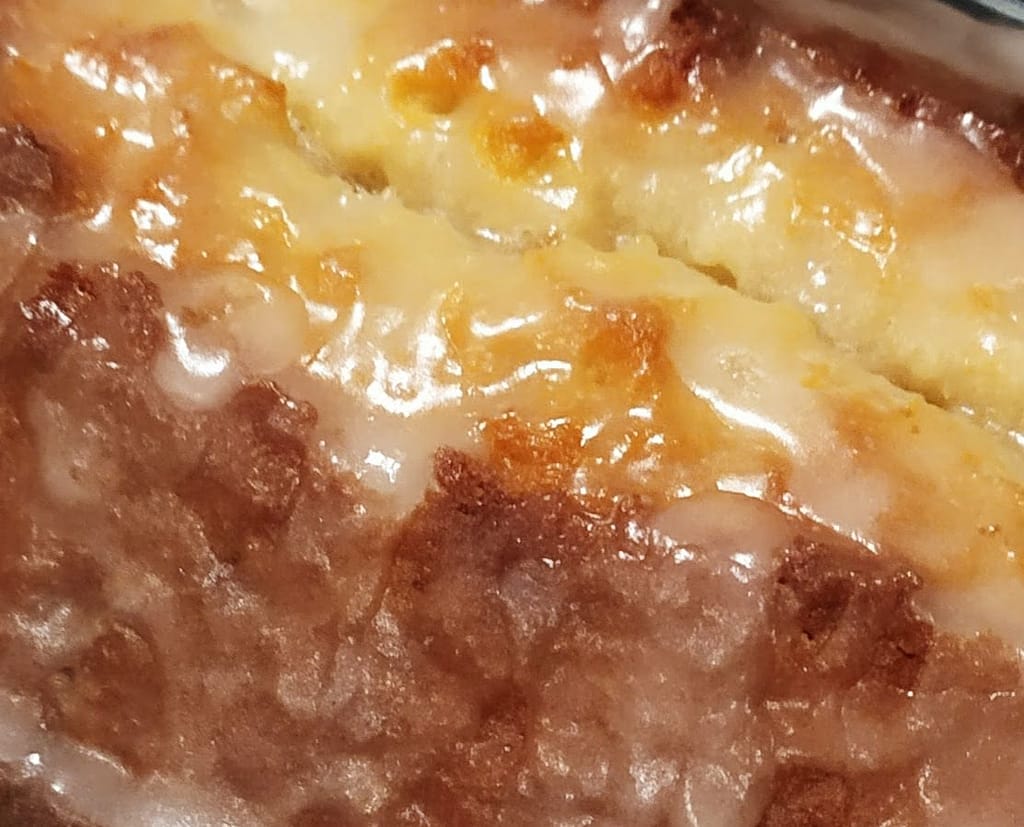 lemon loaf cake porn showing the lemon sugar glaze
