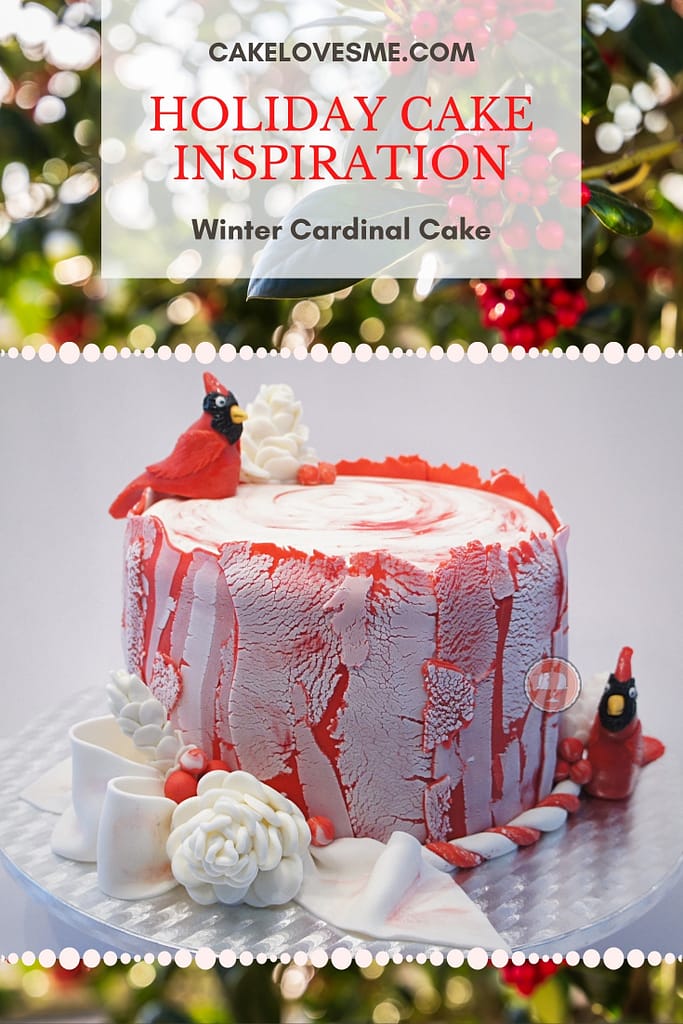 winter cardinal cake with fondant red cardinals white pinecones red berries white bow on a tree stump