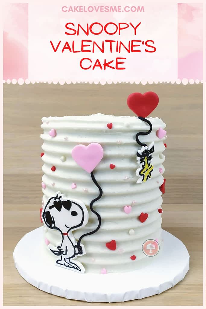 snoopy valentines cake with frosting comb detail fondant hearts snoopy and Woodstock holding heart balloons