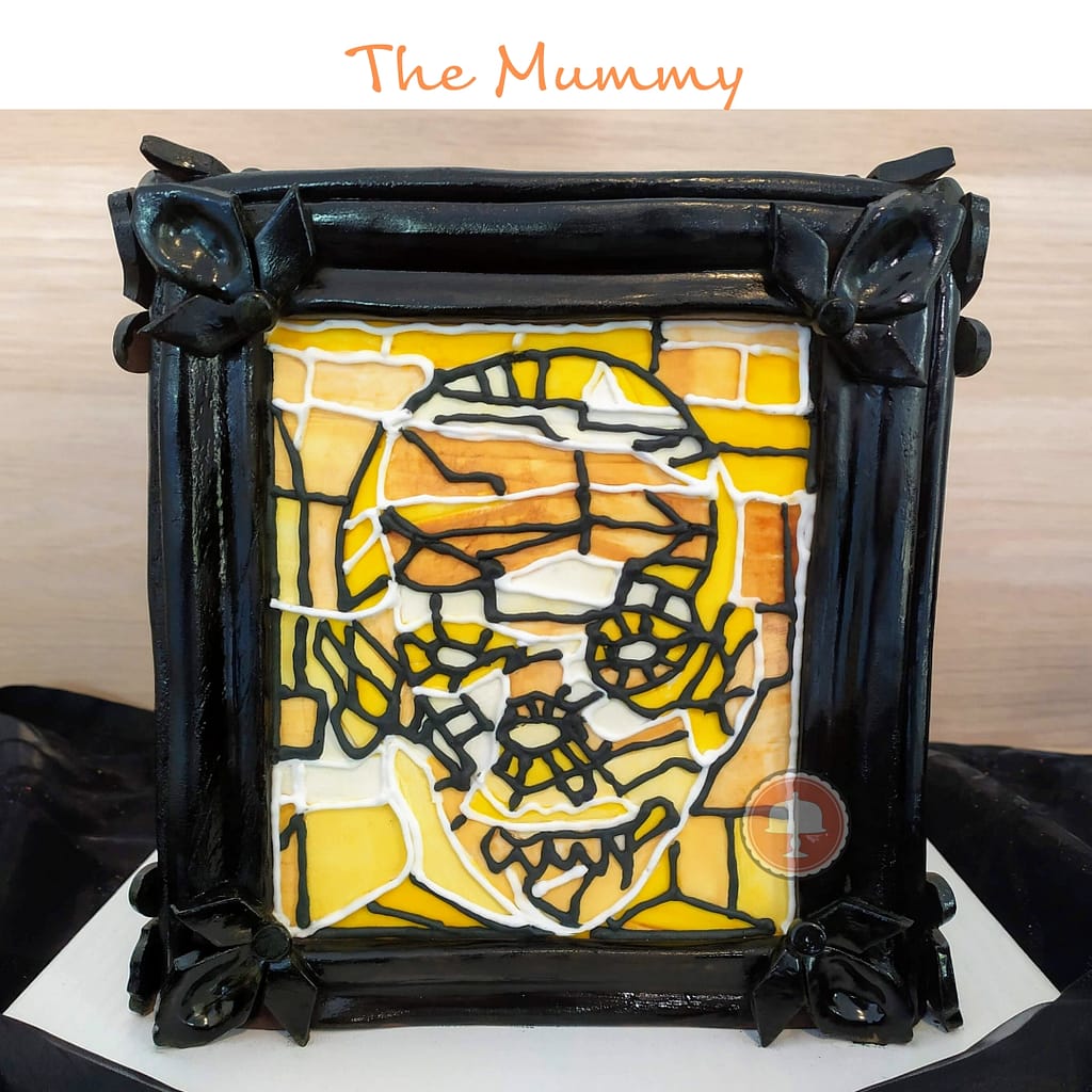 Spooky Halloween Cake Ideas - Stained Glass Movie Monster Cake - CakeLovesMe - Piping Technique, Character Cakes, Halloween Cakes, Stained Glass Cake - halloween cake ideas - royal icing